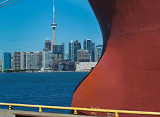 Aft of a ship with Toronto in background